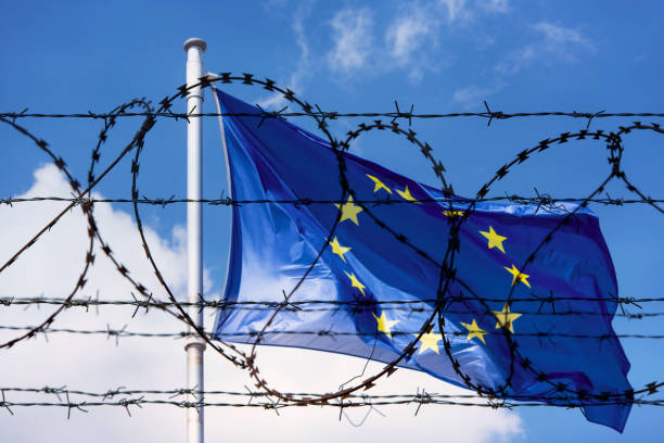 istock EU Flag and fence with barbed Wire concept Picture 959698452