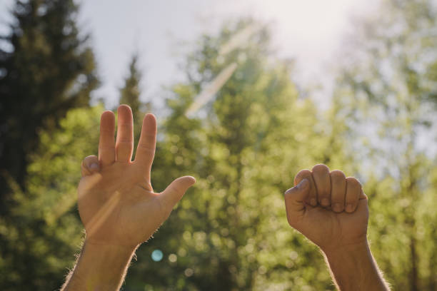 istock hands showing signs numbers 959702538