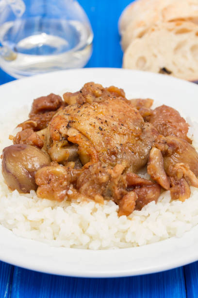 istock chicken with chestnuts and boiled rice on dish 959708050