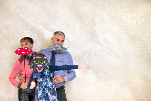 istock Playful Family on Mascarade Party 959708266