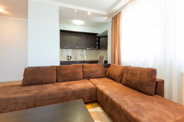 istock Interior of a modern open plan hotel apartment, living room 959708652