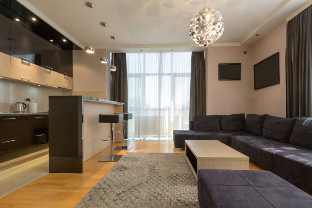 istock Interior of a modern open plan hotel apartment, living room 959711632