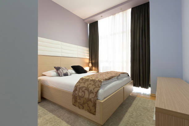 istock Interior of a modern luxury hotel bedroom 959713362
