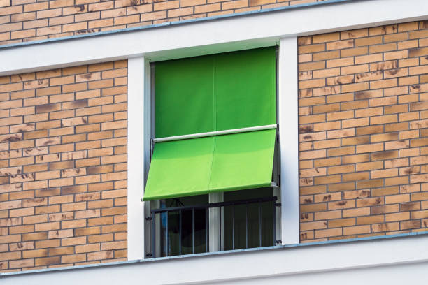 window with outdoor sunblinds , fabric blinds on window exterior - sunblinds imagens e fotografias de stock