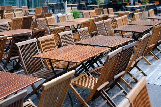 istock empty restaurant, empty tables and chairs in restaurant on day off 959716916