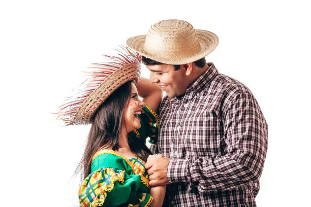 Photo of Young Brazilian couple wearing typical clothes for Festa Junina