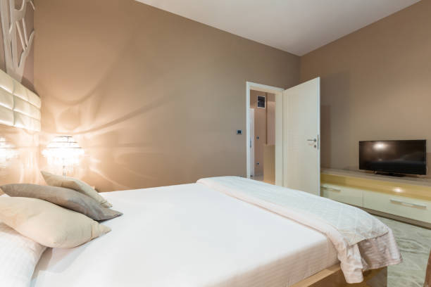 istock Interior of a modern luxury hotel bedroom 959717654