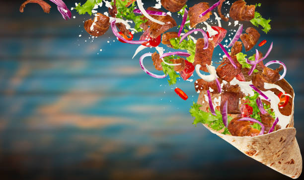 istock Turkish Kebab yufka with flying ingredients 959717864