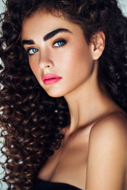 istock Beautiful woman with lush hairstyle 959720176