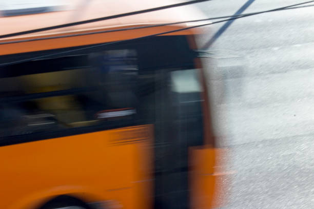 istock Street public bus in motion. 959723390