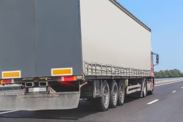 istock truck goes on the highway 959723414