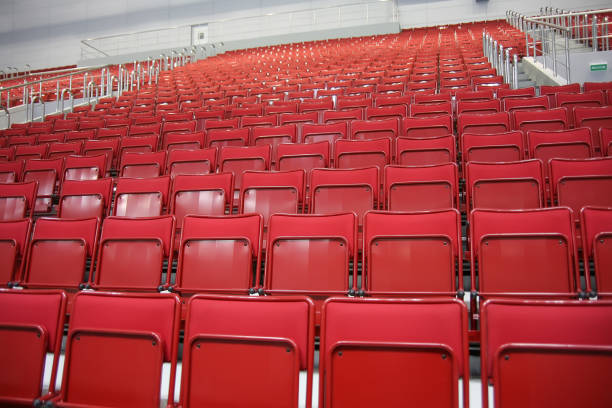 istock rows of red seats at stadium 959723530