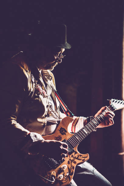 istock Senior Rock Guitarist Performing 959731694