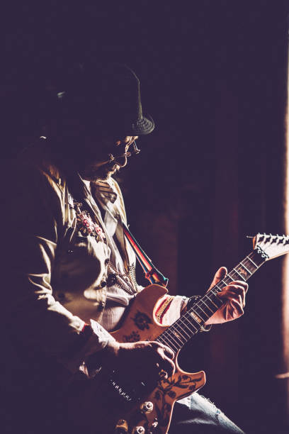 istock Senior Rock Guitarist Performing 959731704