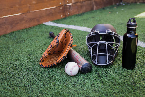 istock New Baseball in a Glove in the Outfield 959732464