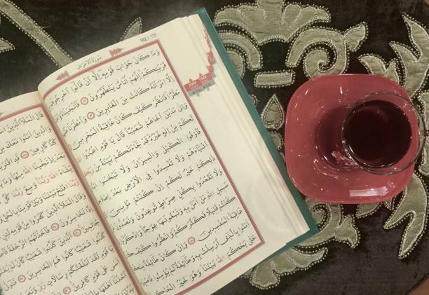 istock Reading Quran and drink black tea 959732774