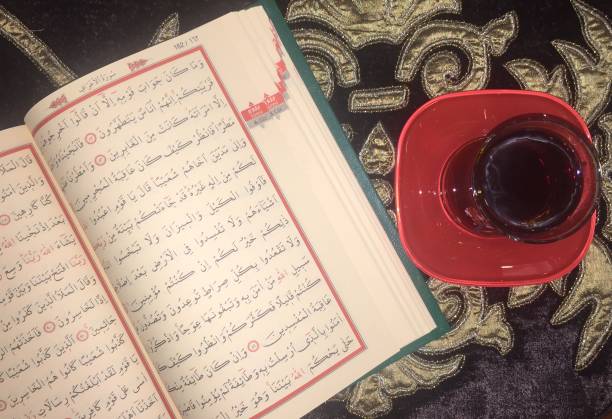 istock Reading Quran and drink black tea 959732786