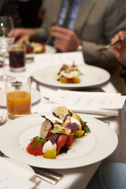 istock Vegetarian food with marinated tomatoes, arugula, mozzarella che 959736850