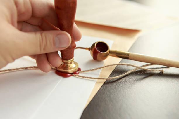 istock Notary's public pen and stamp on testament and last will. 959739988