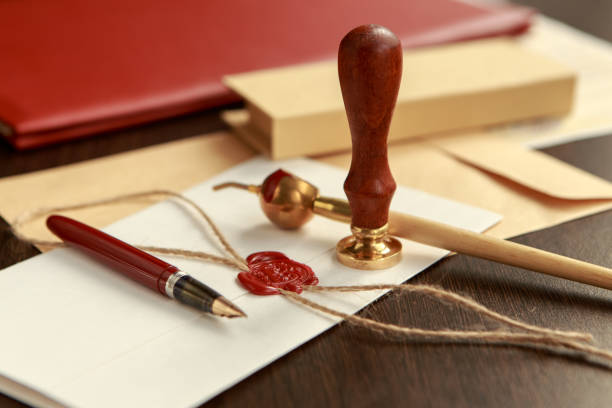 istock Notary's public pen and stamp on testament and last will. 959740032