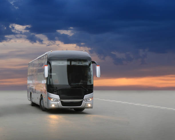 istock bus on asphalt in the evening on sunset 959740588
