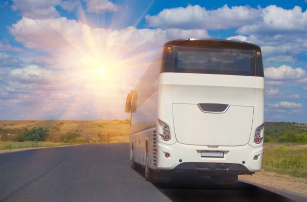 istock bus goes on  country highway 959740772