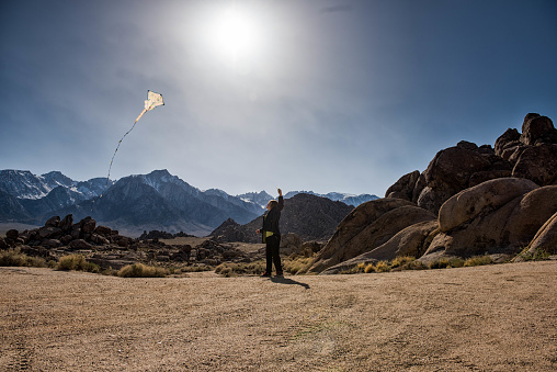 Flying kites in the mountains