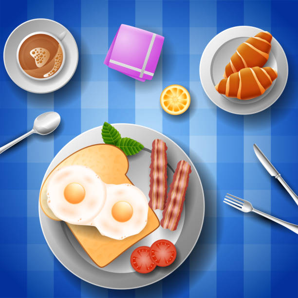 istock Breakfast with eggs, bacon, bread, croissant and a cup of coffee 959771662