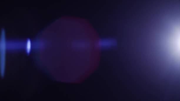 istock Anamorph lens flare in dark background 959772674