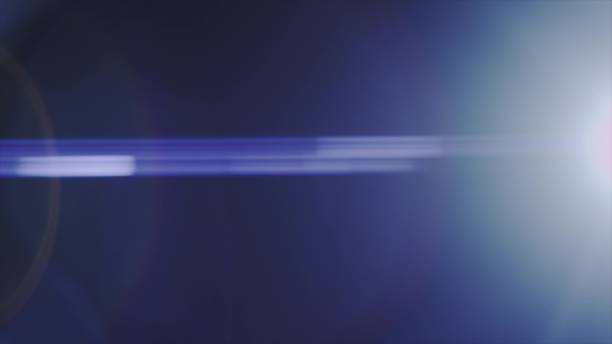 istock Anamorph lens flare in dark background 959772764