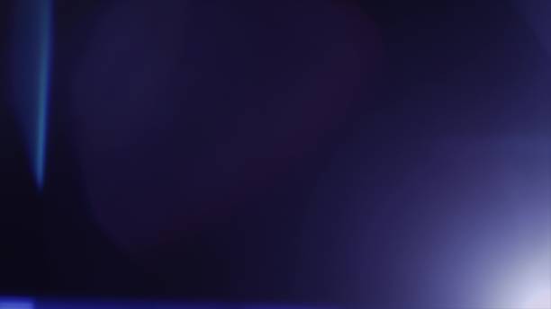 istock Anamorph lens flare in dark background 959772808