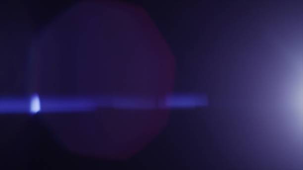 istock Anamorph lens flare in dark background 959772830