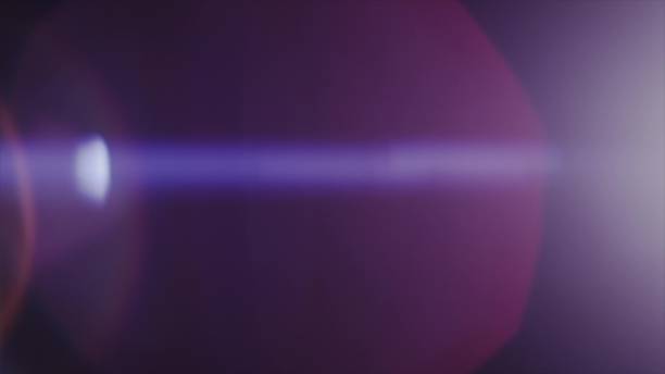 istock Anamorph lens flare in dark background 959772942