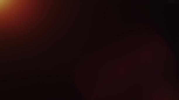 istock Anamorph lens flare in dark background 959772946