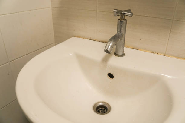 istock close up ceramic washing sink in bathroom 959782608