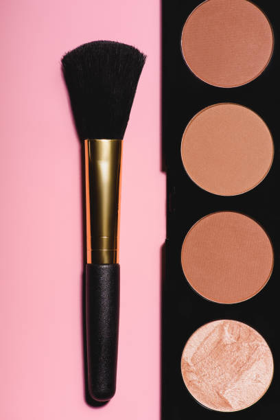 istock top view of bronzer palette with brush on pink surface 959785918