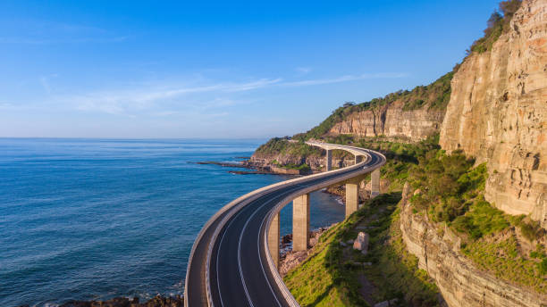 Sea Cliff Bridge Scenic and sunny day on the Sea Cliff Bridge winding road stock pictures, royalty-free photos & images