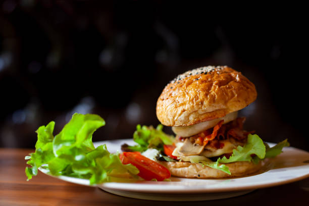 istock Homemade hamburger with fresh vegetables in the restaurant 959787464