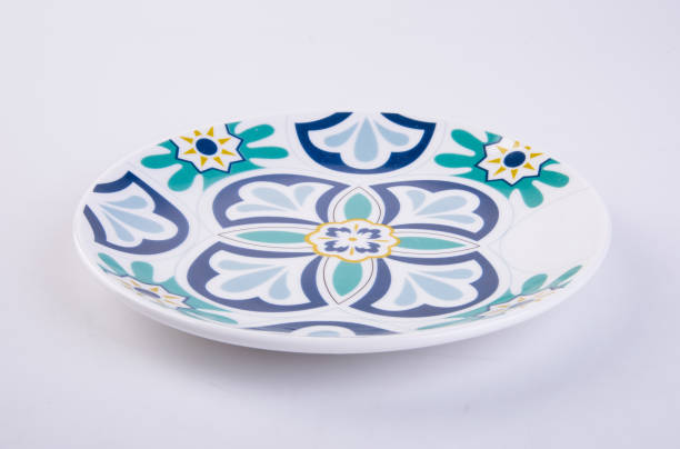 istock plate or flowers on plate painted by hand on background 959792186