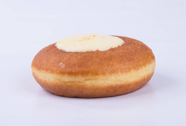 donut sobre un fondo - bavarian cream fotografías e imágenes de stock