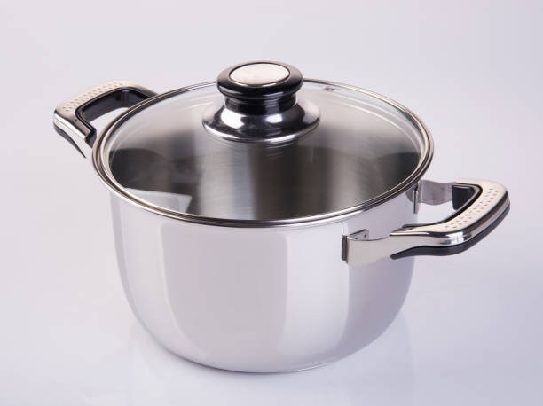 istock pot or stainless steel cooking pot on a background 959803770