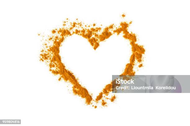 Turmeric Powder In The Shape Of A Heart Isolated On White Empty Space For Text Or Description Stock Photo - Download Image Now