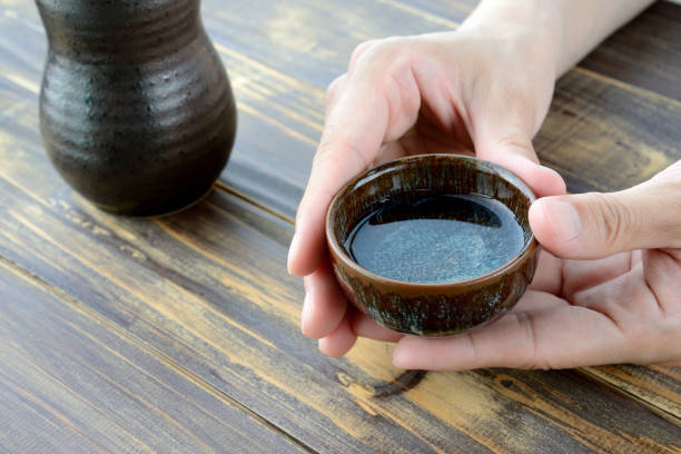 istock Drinking SAKE, Japanese traditional alcoholic drink 959807814
