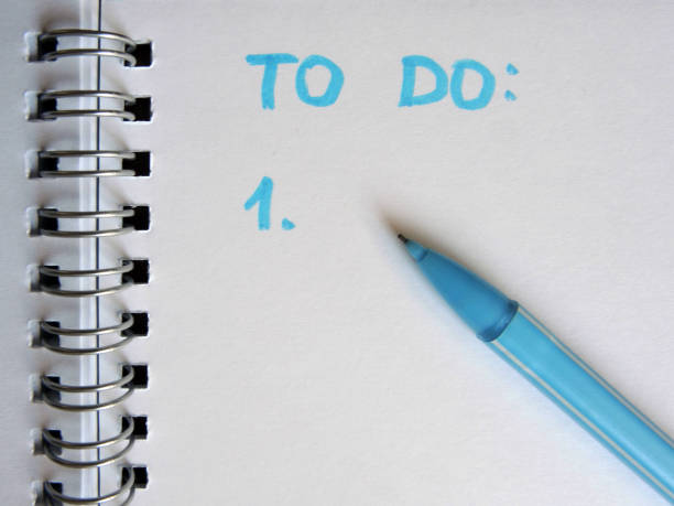 istock To do list written on paper with pen 959808696