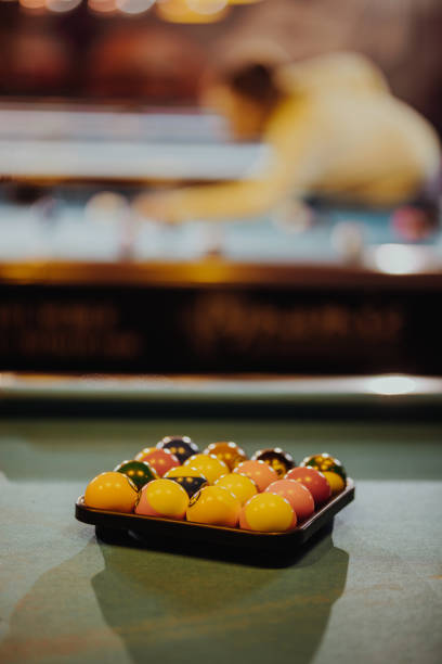 istock Billiard balls arranged in square shape on the pool table. 959812282