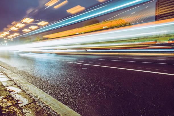 istock Urban highway traffic at night 959815362