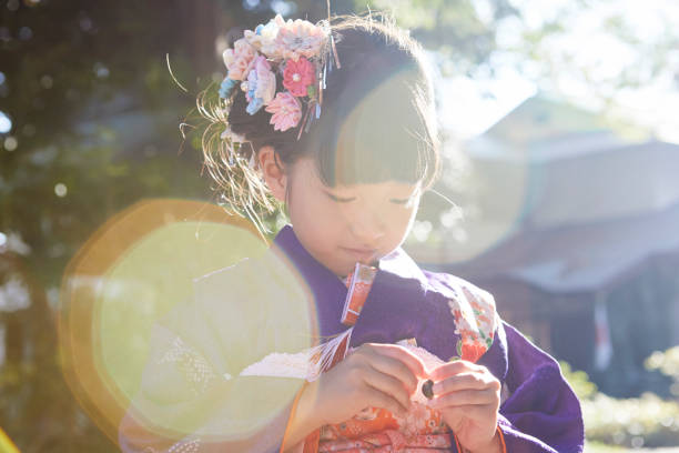 Japanese girls wearing kimonos.