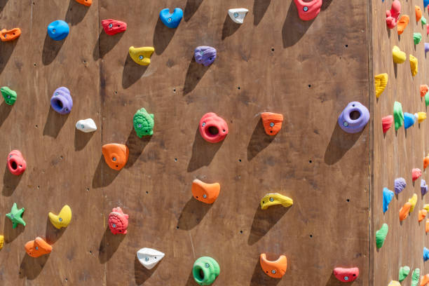 istock Wooden wall for climbing close up. 959822728