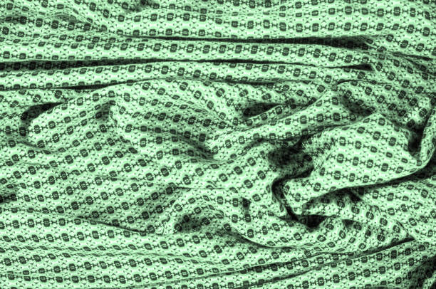 綿グリーン、円のパターンで作られた布。レトロなデザインで、このオリーブ グリーンに幾何学的なストレッチ コットン サテンは、70 年代に最適です! - lime green pleated pattern green ストックフォトと画像