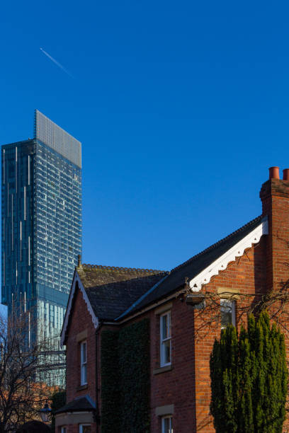 istock Classic Victorian building and modern skyscraper in Castlefield, Manchester, UK 959831550